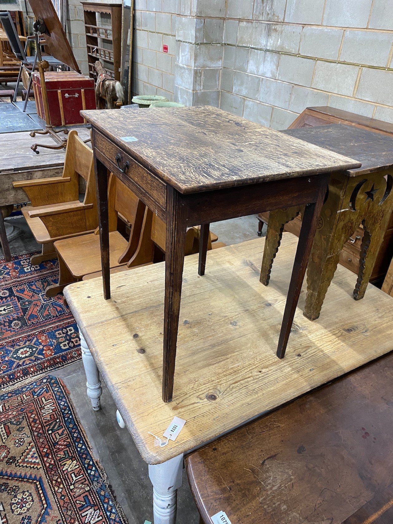 A 17th century style oak side table, width 72cm